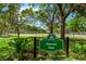 Delaney Park sign featuring manicured landscaping, mature trees and baseball field at 604 Cherokee Dr, Orlando, FL 32801
