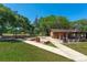 Scenic park view featuring baseball field and a concession stand with an American flag at 604 Cherokee Dr, Orlando, FL 32801