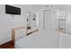 Well-lit bedroom with a TV, closet, and easy access to a kitchen and bathroom at 6165 Carrier Dr # 1304, Orlando, FL 32819