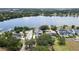 Beautiful aerial showcases waterfront homes with pools and docks in a leafy residential area at 705 N Lake Sybelia Dr, Maitland, FL 32751