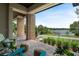 Inviting covered front porch with views of the lake and dock, perfect for relaxing outdoors at 705 N Lake Sybelia Dr, Maitland, FL 32751