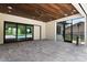 Beautiful outdoor patio featuring wood ceilings, a ceiling fan, and a clear view of the pool at 705 N Lake Sybelia Dr, Maitland, FL 32751