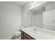 Cozy bathroom features quartz countertops, a single sink and shower tub at 714 Golden Elm Dr, Apopka, FL 32703