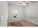 Carpeted bedroom featuring a ceiling fan and a window at 714 Golden Elm Dr, Apopka, FL 32703