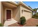 Close up of the front door, including the brick paved driveway at 714 Golden Elm Dr, Apopka, FL 32703