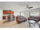 Spacious layout of living room, kitchen and dining area in the house at 714 Golden Elm Dr, Apopka, FL 32703