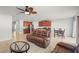 Open concept living room and kitchen provide an inviting and spacious atmosphere at 714 Golden Elm Dr, Apopka, FL 32703
