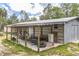 Large outbuilding with ample space for storage, workshop, or other hobby activities at 723 River Run Rd, Osteen, FL 32764