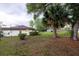 Spacious backyard with lush greenery, providing a private and serene outdoor setting at 789 Barger Dr, Deltona, FL 32738
