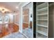 Bedroom with hardwood floors, large closet, and easy access to the bathroom at 789 Barger Dr, Deltona, FL 32738