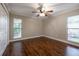 Bedroom with wood floors, large windows offering plenty of natural light and a closet at 789 Barger Dr, Deltona, FL 32738