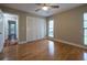 Bedroom featuring hardwood floors, ceiling fan, closet, and abundant natural light at 789 Barger Dr, Deltona, FL 32738