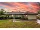 Charming single-story home with lush landscaping and a neatly manicured green lawn, perfect curb appeal at 789 Barger Dr, Deltona, FL 32738