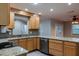 Well-appointed kitchen featuring granite countertops, modern appliances, and ample cabinet space, perfect for cooking at 789 Barger Dr, Deltona, FL 32738
