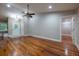 Hardwood floors in the living room, with a built-in window seat at the entryway at 789 Barger Dr, Deltona, FL 32738