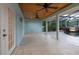 Covered outdoor patio overlooking the pool area and lush landscaping at 789 Barger Dr, Deltona, FL 32738