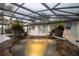 Inviting in-ground pool and spa surrounded by a screened enclosure for year-round enjoyment at 789 Barger Dr, Deltona, FL 32738