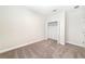 This bedroom has neutral walls and carpet along with a spacious closet at 7931 Rock Dove Dr, Winter Garden, FL 34787