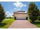 Charming home featuring a brick driveway and a two-car garage at 7931 Rock Dove Dr, Winter Garden, FL 34787