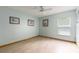 Light blue bedroom with light beige tile floors, ceiling fan, and window at 812 Silverwood Dr, Lake Mary, FL 32746