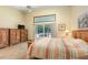 Bright bedroom view to include a large sliding glass door to the pool and lanai at 812 Silverwood Dr, Lake Mary, FL 32746