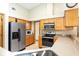 Well-lit kitchen featuring stainless steel appliances and ample counter space at 812 Silverwood Dr, Lake Mary, FL 32746