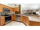 Efficiently laid-out kitchen with a built-in dishwasher, sink, and range oven at 812 Silverwood Dr, Lake Mary, FL 32746