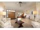 Spacious living area open to dining, featuring tile floors and plenty of natural light at 812 Silverwood Dr, Lake Mary, FL 32746