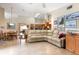 Comfortable living room design with view to kitchen, fireplace and dining room at 812 Silverwood Dr, Lake Mary, FL 32746