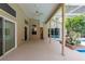 Covered patio has a ceiling fan, access to a pool, and a landscaped outdoor area at 812 Silverwood Dr, Lake Mary, FL 32746