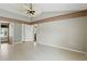 A bright bedroom featuring high ceilings, a fan, and a neutral color scheme at 826 Bright Meadow Dr, Lake Mary, FL 32746
