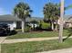 Cozy single-story home with mature palms in a well-maintained community at 826 Bright Meadow Dr, Lake Mary, FL 32746
