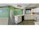 Bright eat-in kitchen features an island, tile floors, and plenty of cabinet space at 826 Bright Meadow Dr, Lake Mary, FL 32746