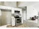Bright kitchen features stainless appliances and ample cabinet space at 826 Bright Meadow Dr, Lake Mary, FL 32746