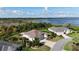 Beautiful home with meticulous landscaping and a stunning lake view at 871 Iron Oak Way, The Villages, FL 32163