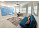 Comfortable home office setup with large world map and futon at 871 Iron Oak Way, The Villages, FL 32163