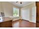 Cozy room with hardwood flooring, a closet, and a bright window at 914 Sweetgum Valley Pl, Lake Mary, FL 32746