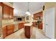 Spacious kitchen featuring granite countertops, an island, and stainless steel appliances at 914 Sweetgum Valley Pl, Lake Mary, FL 32746