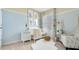 Cozy Bedroom showcasing soft blue walls, a white crib, and whimsical animal artwork at 939 Princess Sabal Pt, Haines City, FL 33844