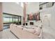 Elegant living area with high ceilings, home theatre, and a view to the outdoor living space at 9567 Meadow Hunt Way, Winter Garden, FL 34787