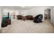 Spacious loft area with comfortable leather seating at 9567 Meadow Hunt Way, Winter Garden, FL 34787