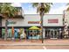 Exterior view of retail stores including AT&T, Jeremiah's, and Bronson Liquors at 9567 Meadow Hunt Way, Winter Garden, FL 34787