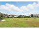 Community featuring manicured lawn and multiple buildings at 9820 Bucklow Hill Dr, Orlando, FL 32832