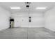 Spacious two car garage with epoxy floors and new water heater at 9820 Bucklow Hill Dr, Orlando, FL 32832