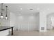 Bright, open-concept living area with tile flooring and modern fixtures, perfect for entertaining guests at 9820 Bucklow Hill Dr, Orlando, FL 32832