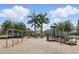 Fun playground area with swings and play structure, perfect for Gathering enjoyment at 9820 Bucklow Hill Dr, Orlando, FL 32832