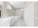 Spacious bathroom features double sinks, soaking tub, and walk-in shower at 9885 Montclair Circle Cir, Apopka, FL 32703