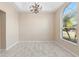 Dining room with large window and stylish light fixture at 9885 Montclair Circle Cir, Apopka, FL 32703