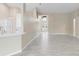 Bright, open-concept living area with natural light and neutral color palette at 9885 Montclair Circle Cir, Apopka, FL 32703