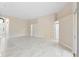 Open concept living room with tile floors and neutral walls at 9885 Montclair Circle Cir, Apopka, FL 32703